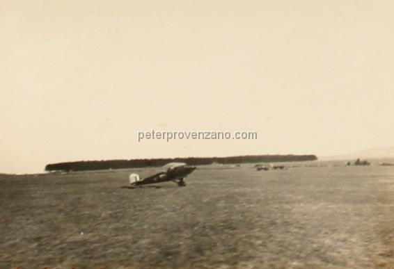 Peter Provenzano Photo Album Image_copy_106.jpg - Hawker Hart biplane trainer in the distance. RAF Station Netheravon, England.  No. 1 S.F.T.S. (Service Flight Training School).
Peter Provenzano was with the No. 1 S.F.T.S from September 8, 1941 to 
December 8, 1941.